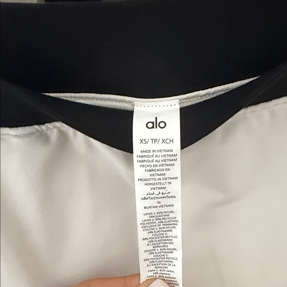 ALO Yoga White Mini Skort with Black Waistband and Trim - Picture 2 of 3